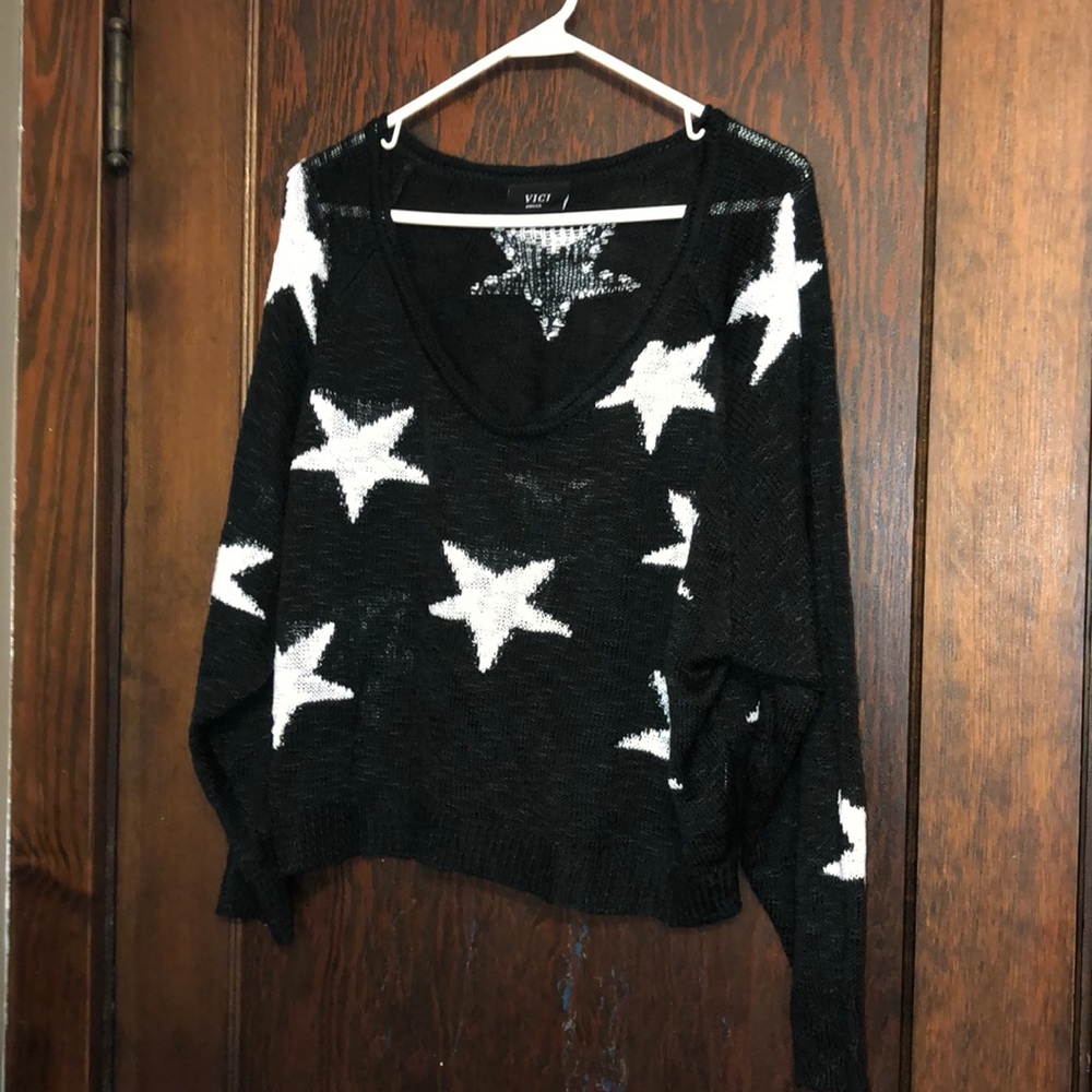 Black and white cropped star sweater